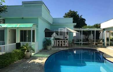 Imagem: A casa possui 4 Dormitórios, 3 Banheiros, 5 Vagas na garagem