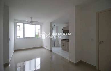 Imagem: O apartamento possui 2 Dormitórios, 1 Banheiro, 1 Vaga na garagem