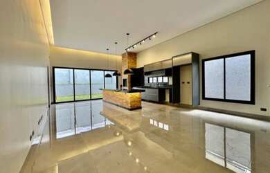 Imagem: A casa possui 2 Dormitórios, 2 Banheiros, 3 Vagas na garagem