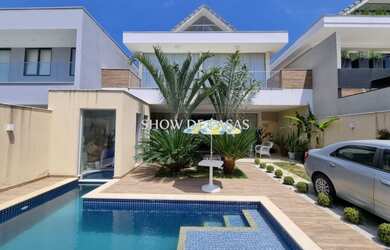 Imagem: A casa em condomínio possui 4 Dormitórios, 5 Banheiros, 2