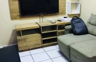 Imagem: O apartamento possui 2 Dormitórios, 1 Banheiro, 1 Vaga na garagem