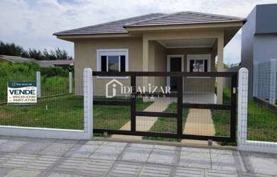 Imagem: A casa possui 3 Dormitórios, 2 Banheiros, 1 Vaga na garagem