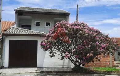 Imagem: A casa possui 2 Dormitórios, 4 Banheiros, 2 Vagas na garagem