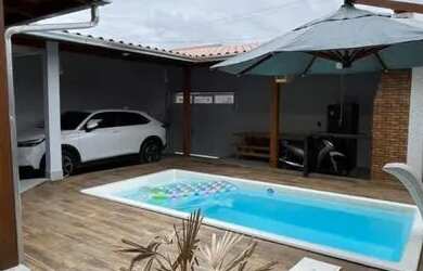 Imagem: A casa possui 3 Dormitórios, 5 Banheiros, 1 Vaga na garagem