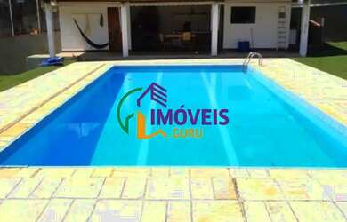 Imagem: A casa possui 5 Dormitórios, 3 Banheiros, 4 Vagas na garagem