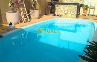 Imagem: A casa possui 5 Dormitórios, 3 Banheiros, 4 Vagas na garagem