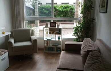 Imagem: O apartamento possui 3 Dormitórios, 1 Banheiro, 1 Vaga na garagem