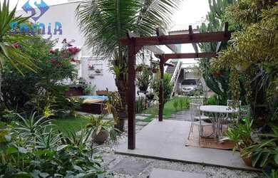 Imagem: A casa possui 5 Dormitórios, 5 Banheiros, 2 Vagas na garagem