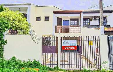 Imagem: A casa possui 3 Dormitórios, 2 Banheiros, 129m² de Área e