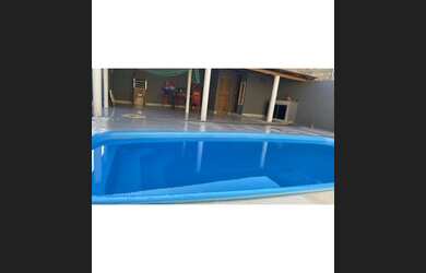 Imagem: A casa possui 3 Dormitórios, 3 Banheiros, 3 Vagas na garagem