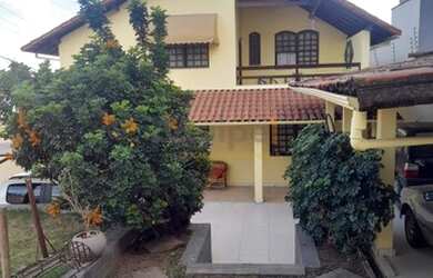 Imagem: A casa possui 5 Dormitórios, 4 Banheiros, 5 Vagas na garagem