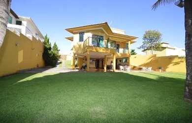 Imagem: A casa possui 4 Dormitórios, 5 Banheiros, 5 Vagas na garagem