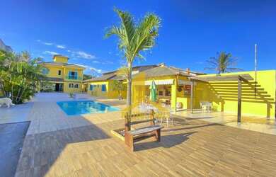 Imagem: A casa possui 5 Dormitórios, 5 Banheiros, 3 Vagas na garagem