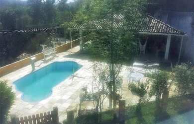 Imagem: A casa em condomínio possui 3 Dormitórios, 4 Banheiros, 5