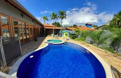 Imagem: A casa em condomínio possui 4 Dormitórios, 5 Banheiros, 5