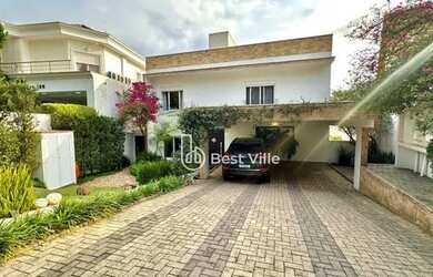 Imagem: A casa em condomínio possui 4 Dormitórios, 5 Banheiros, 4