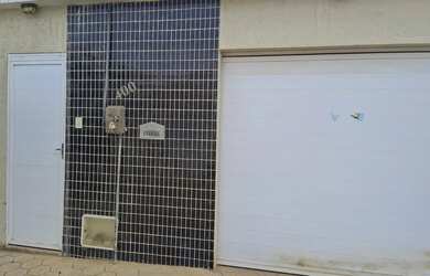 Imagem: A casa possui 2 Dormitórios, 2 Banheiros, 3 Vagas na garagem