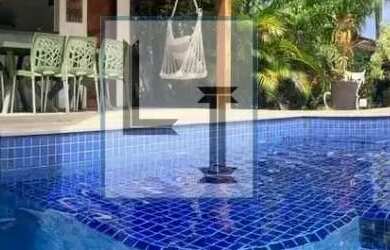 Imagem: A casa em condomínio possui 5 Dormitórios, 4 Banheiros, 2