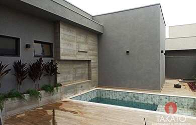 Imagem: A casa em condomínio possui 4 Dormitórios, 5 Banheiros, 2