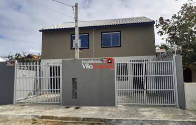 Imagem: A casa possui 3 Dormitórios, 3 Banheiros, 1 Vaga na garagem