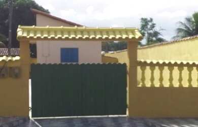 Imagem: A casa possui 4 Dormitórios, 4 Banheiros, 5 Vagas na garagem