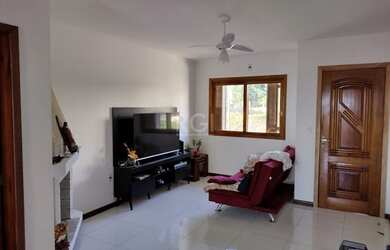 Imagem 3: Casa em Guarujá. Churrasqueira, Lareira, 2 Vagas na garageme3 Dormitórios