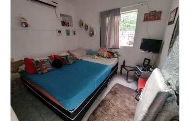 Imagem: A casa possui 5 Dormitórios, 2 Banheiros, 3 Vagas na garagem