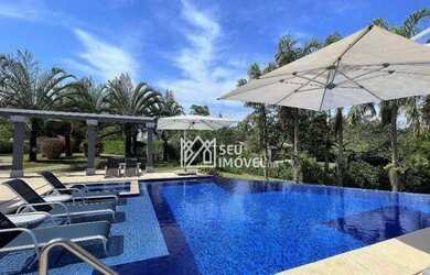 Imagem: A casa em condomínio possui 4 Dormitórios, 5 Banheiros, 5