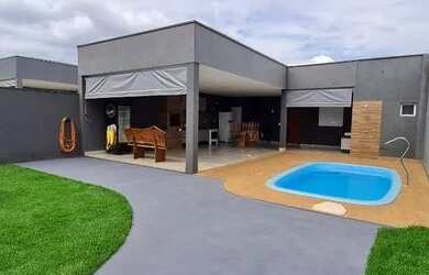 Imagem: A casa possui 3 Dormitórios, 1 Vaga na garagem e está localizado