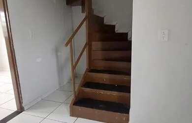 Imagem: A casa possui 3 Dormitórios, 2 Banheiros, 4 Vagas na garagem