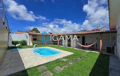 Imagem: A casa possui 3 Dormitórios, 3 Banheiros, 2 Vagas na garagem