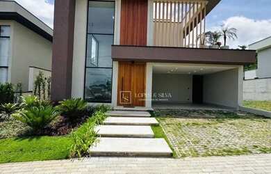 Imagem: A casa em condomínio possui 4 Dormitórios, 5 Banheiros, 4