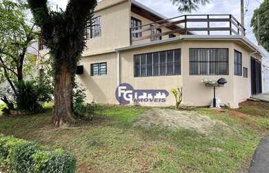 Imagem: A casa possui 2 Dormitórios, 3 Banheiros, 2 Vagas na garagem