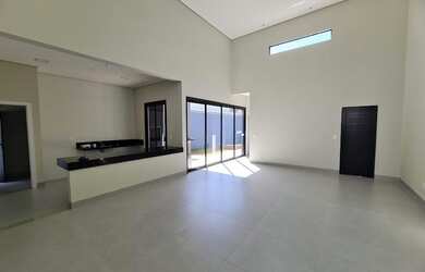 Imagem: A casa possui 3 Dormitórios, 5 Banheiros, 3 Vagas na garagem