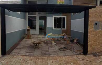 Imagem: A casa possui 2 Dormitórios, 1 Banheiro, 2 Vagas na garagem