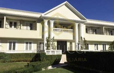 Imagem: A casa possui 5 Dormitórios, 5 Banheiros, 5 Vagas na garagem