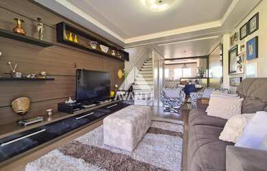 Imagem: A casa possui 2 Dormitórios, 2 Banheiros, 3 Vagas na garagem