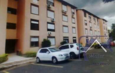 Imagem: O apartamento possui 2 Dormitórios, 1 Banheiro, 1 Vaga na garagem