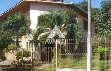 Imagem: A casa possui 3 Dormitórios, 2 Banheiros, 3 Vagas na garagem