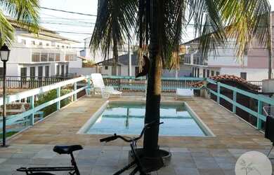 Imagem: A casa possui 4 Dormitórios, 4 Banheiros, 4 Vagas na garagem