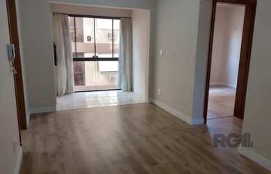 Imagem: O apartamento possui 3 Dormitórios, 1 Banheiro, 1 Vaga na garagem