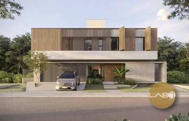 Imagem: A casa em condomínio possui 4 Dormitórios, 5 Banheiros, 2