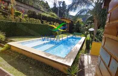 Imagem: A casa possui 5 Dormitórios, 5 Banheiros, 3 Vagas na garagem