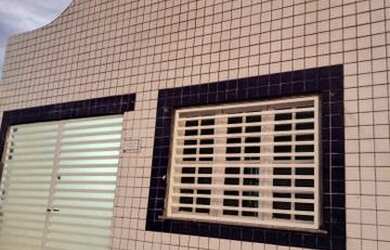 Imagem: A casa possui 2 Dormitórios, 1 Banheiro, 1 Vaga na garagem