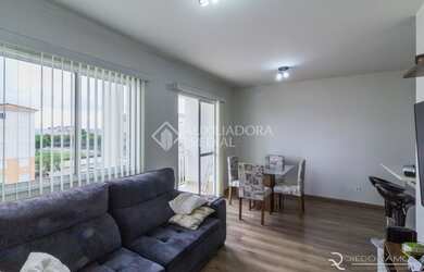 Imagem: O apartamento possui 3 Dormitórios, 1 Banheiro, 1 Vaga na garagem