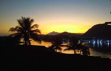 Imagem: A casa possui 3 Dormitórios e está localizado em Praia da