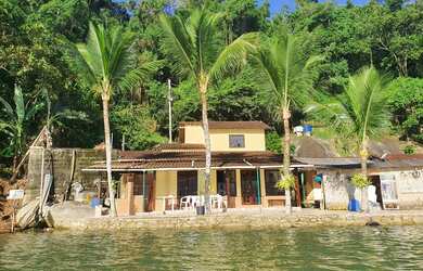 Imagem: A casa possui 3 Dormitórios e está localizado em Paraty