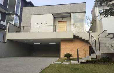 Imagem: A casa em condomínio possui 3 Dormitórios, 5 Banheiros, 5