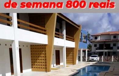 Imagem: A casa possui 4 Dormitórios e 2 Vagas na garagem e está localizado