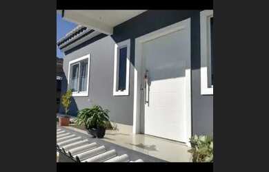 Imagem: A casa possui 2 Dormitórios, 2 Banheiros, 1 Vaga na garagem